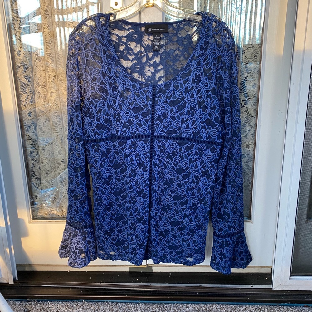 Women’s lacy blue sheer top. Size L
